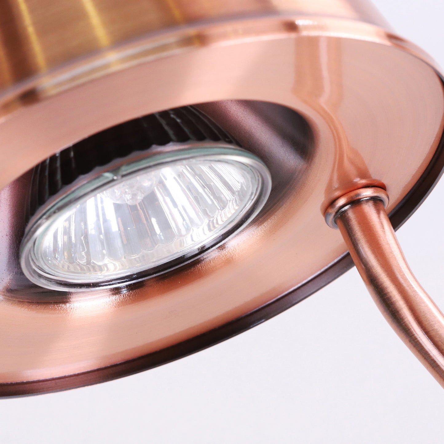 Image, light bulb installed in copper candle warmer.